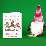 Cute Gnomes Merry Christmas Holiday Card<br><div class="desc">Cute personalized folded holiday card featuring three Scandinavian-style gnomes with seasonal red and green hats and tunics under red,  green and gold snowflakes. Personalize the "Merry Christmas" greeting (e.g.,  "Happy Holidays") in fun red typography and your name at the bottom. Add a message inside or leave blank.</div>