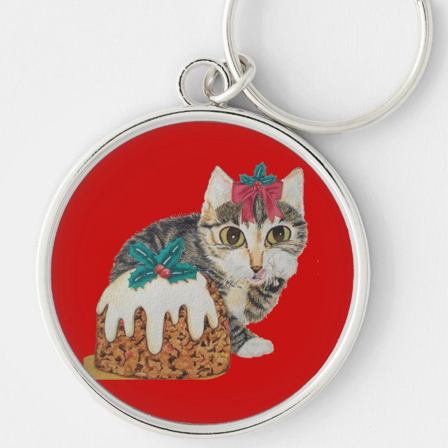 cute grey kitten licking paw at christmas keychain (Front)