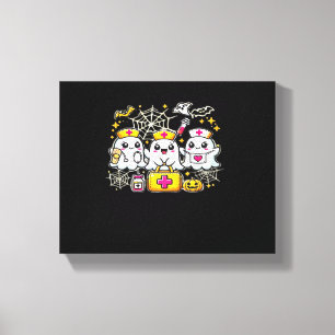 Cute Halloween Ghost Nurse Trio with Medical Kit a Canvas Print