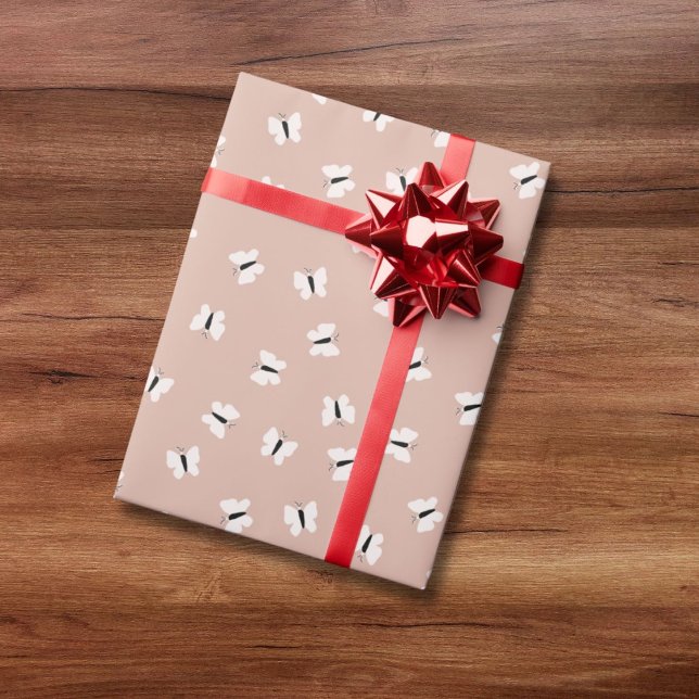 Cute hand drawn butterfly pattern on pink wrapping paper (Creator Uploaded)