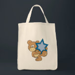 cute hanukkah teddy bear holding star of david tote bag<br><div class="desc">Such a cute little bear expressing emotion and action.  Provided by Dooni Designs.  Great gift for teddy bear collectors,  kids. or just anyone who loves bears and needs a smile.  Many products are customizable!</div>