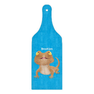Cute happy bearded dragon lizard cartoon  cutting board