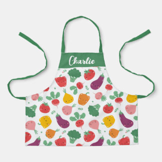 Cute happy colourful veggies on white background apron