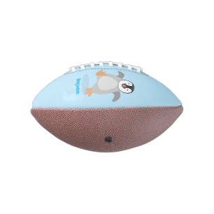 Cute happy emperor penguin chick cartoon football