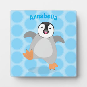 Cute happy emperor penguin chick cartoon plaque