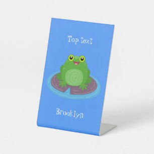 Cute happy green frog cartoon illustration pedestal sign