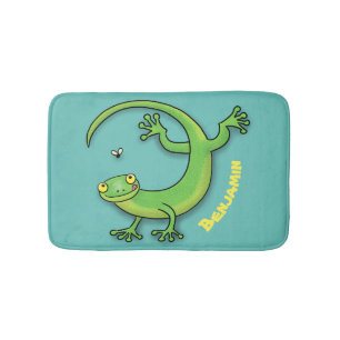 Cute happy green gecko greetings with bug cartoon bath mat