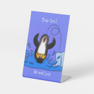 Cute happy jumping penguin cartoon illustration pedestal sign