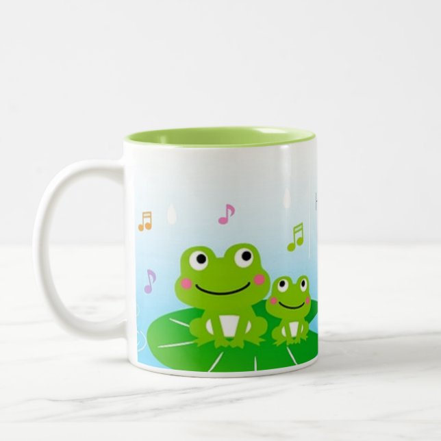 Cute happy little frogs Two-Tone coffee mug (Left)