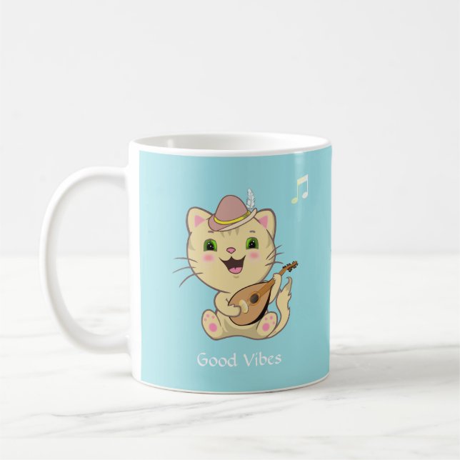 Cute Happy Musical Ginger Tabby Cat on Light Blue Coffee Mug (Left)