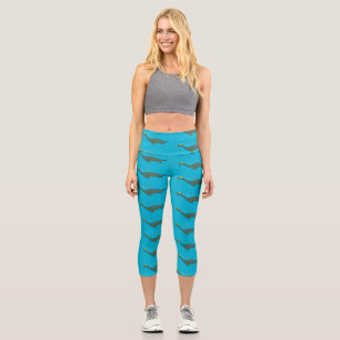 Cute, happy sea monster plesiosaur cartoon capri leggings