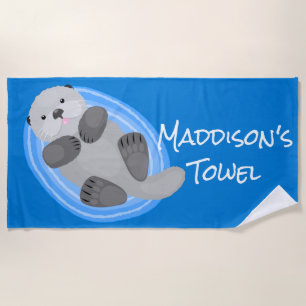 Cute happy sea otter blue cartoon illustration beach towel