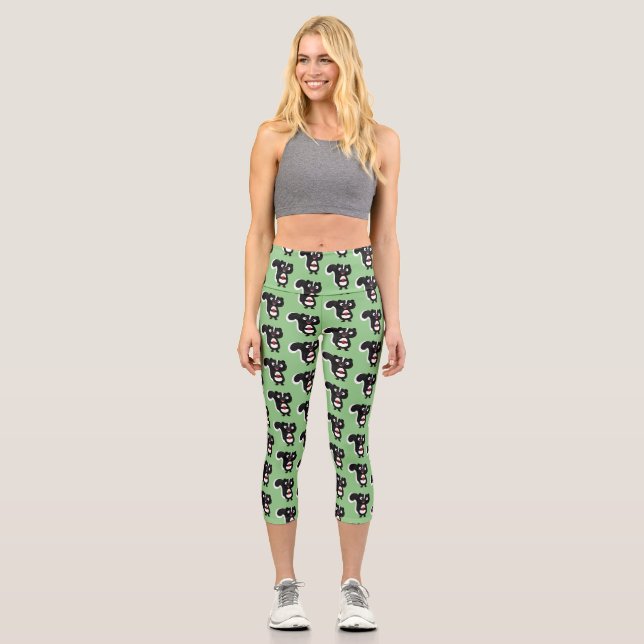 Cute happy skunk cartoon illustration capri leggings (Front)