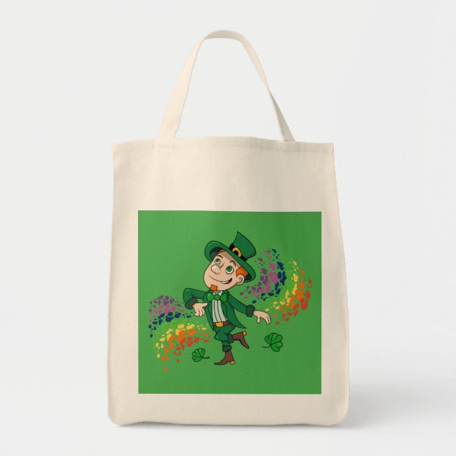 Cute happy smiling dancing leprechaun, a rainbow  tote bag (Front)