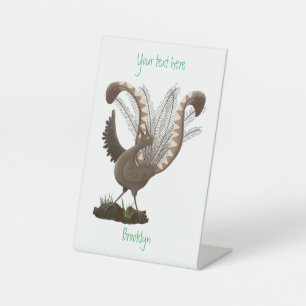 Cute happy superb lyrebird cartoon illustration pedestal sign
