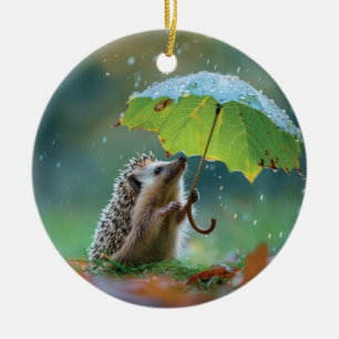 Cute hedgehog holding a leaf umbrella ceramic ornament