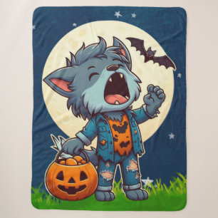 Cute howling werewolf monster with pumpkin sherpa blanket