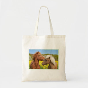 Cute Icelandic Horses Cuddle in a Spring Meadow - Tote Bag
