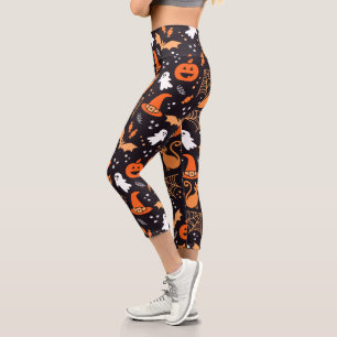 Cute Illustrated halloween characters on black bg Capri Leggings
