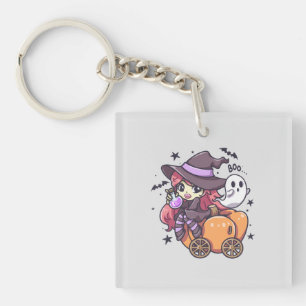 Cute Kid Witch Sitting on a Pumpkin Car Keychain