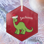 Cute Kids Christmas Dinosaur Red Custom Glass Ornament<br><div class="desc">Awesome green dinosaur smiling and looking very cute in a holiday red Santa hat. I like prehistoric Christmas animals and presents that kids will love. Customize this gift with the recipient's name to make it even more personalized.</div>