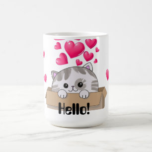 Cute kitten peeking out of a box coffee mug