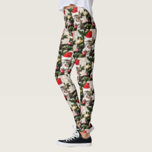 Cute Kitten playing with the Christmas Tree Cat Leggings