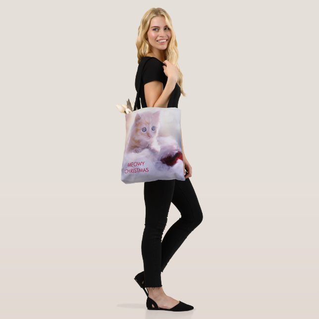 Cute Kitten Resting On a Santa Hat Meowy Christmas Tote Bag (On Model)