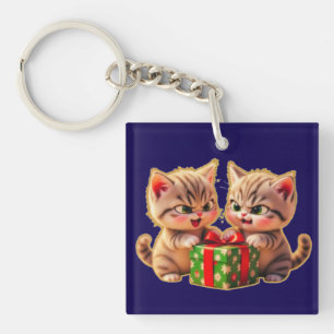 **Cute Kittens Fighting Over a Gift – Funny Christ Keychain