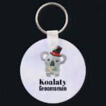 Cute Koala Pun Koalaty Groomsman Keychain<br><div class="desc">A keychain with a cute koala bear in a black top hat with a red ribbon. Fancy and furry. Text says Koalaty Groomsman. Funny pun. Set on a light purple background.</div>