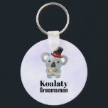 Cute Koala Pun Koalaty Groomsman Keychain<br><div class="desc">A keychain with a cute koala bear in a black top hat with a red ribbon. Fancy and furry. Text says Koalaty Groomsman. Funny pun. Set on a light purple background.</div>