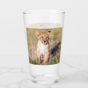 Cute lion cub in Africa photo Glass