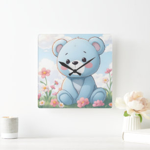 Cute little blue teddy bear in garden square wall clock