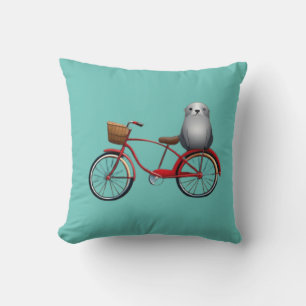 Cute little cartoon seal on a bicycle throw pillow