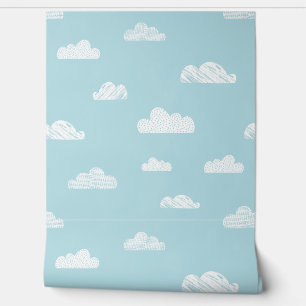 Cute little clouds on light blue wallpaper