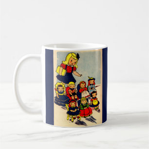 cute little girl playing school with her dolls coffee mug