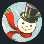 Cute Little Retro Snowman Classic Round Sticker<br><div class="desc">Vintage colour illustration of a cute round snowman head with black top hat and red scarf trimmed in green.</div>