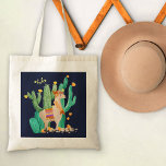 Cute Llama in Cactus Garden with Yellow Flowers Tote Bag<br><div class="desc">Cute llama scene in watercolor, which you can personalize with your name or custom text. This pretty blonde llama has a flower and feathers in her hair, a matching garland and a traditional Peruvian saddle mat. She is standing in a flowering cactus garden with pretty yellow blooms. This is a...</div>