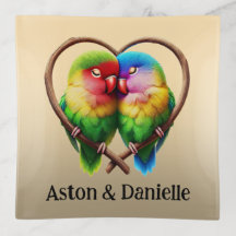 Cute Lovebirds Cuddling in a Heart Shaped Bough