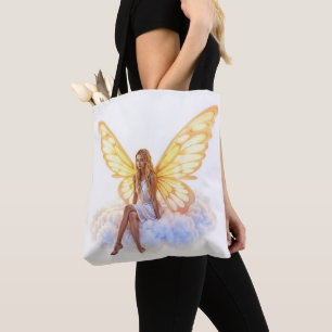 Cute magic blue eyes fairy bright golden wings tote bag