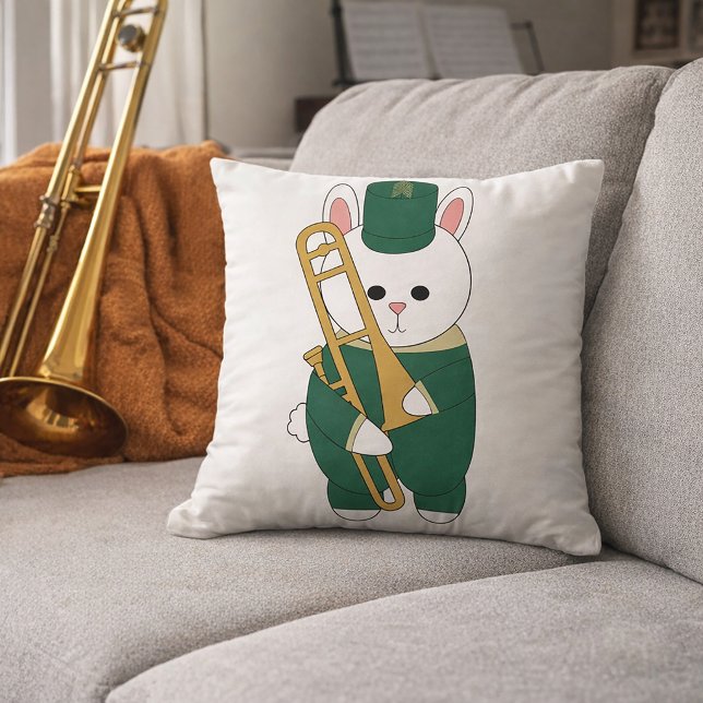Cute Marching Bunny Trombone Player Cartoon Green  Throw Pillow (A throw pillow with a cute bunny holding a trombone in a green and gold marching band uniform.)