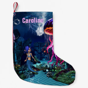 Cute mermaid looks at the beautiful jellyfish small christmas stocking