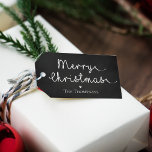 Cute Minimalist Simple Black White Merry Christmas Gift Tags<br><div class="desc">Cute Minimalist Simple Black White Merry Christmas Gift Tags . These cute little gift tags have Merry Christmas written in a pretty script font . These stickers can be customized by changing the family name and can be paired with the cute coordinating wrapping papers which can be found in the...</div>