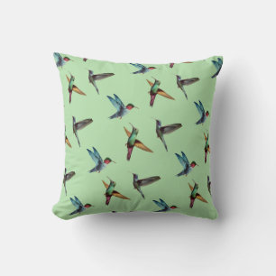 Cute multicolored hummingbirds on olive green throw pillow