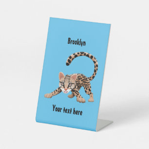 Cute ocelot cartoon illustration pedestal sign