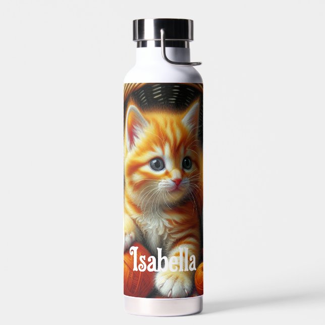 Cute Orange and White Kitten  Playing in Yarn Water Bottle (Left)