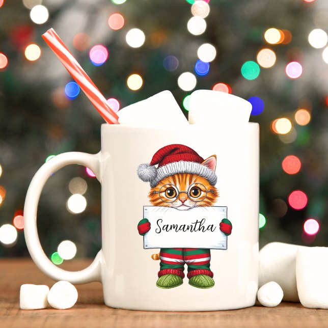Cute Orange Cat Personalized Christmas Mug (Orange kitty wearing a Santa hat and Christmas pajama, custom Christmas mug. Cat lover gift idea)