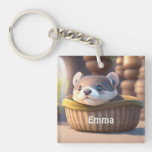Cute otter baby in a basket - personalizable keychain