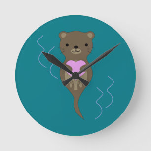 Cute Otter Hugging a Pink Heart Round Clock