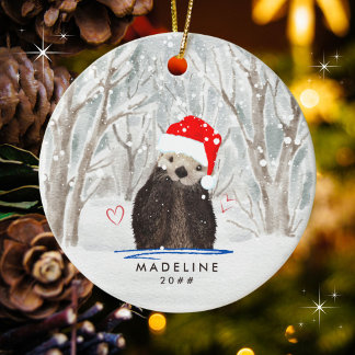 Cute Otter with Santa Hat Kid's Name Ceramic Ornament